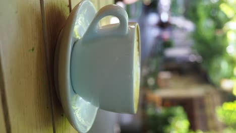 cup of coffee on a wooden table