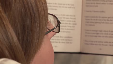 Stock-Footage-of-a-Woman-Reading-a-Book