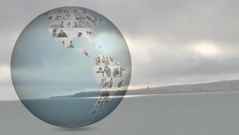 translucent globe sphere hovering over coastal scene displaying animated business snapshots collage