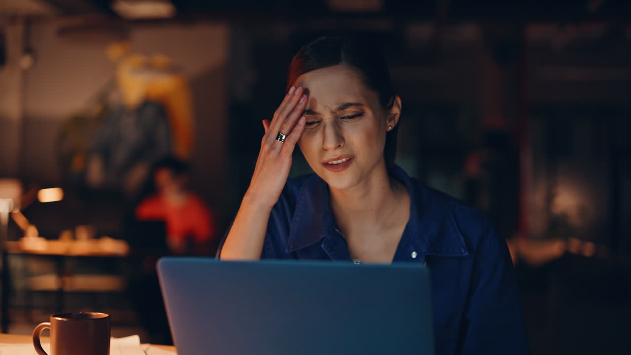 Night manager shocked failure looking laptop closeup. Frustrated businesswoman