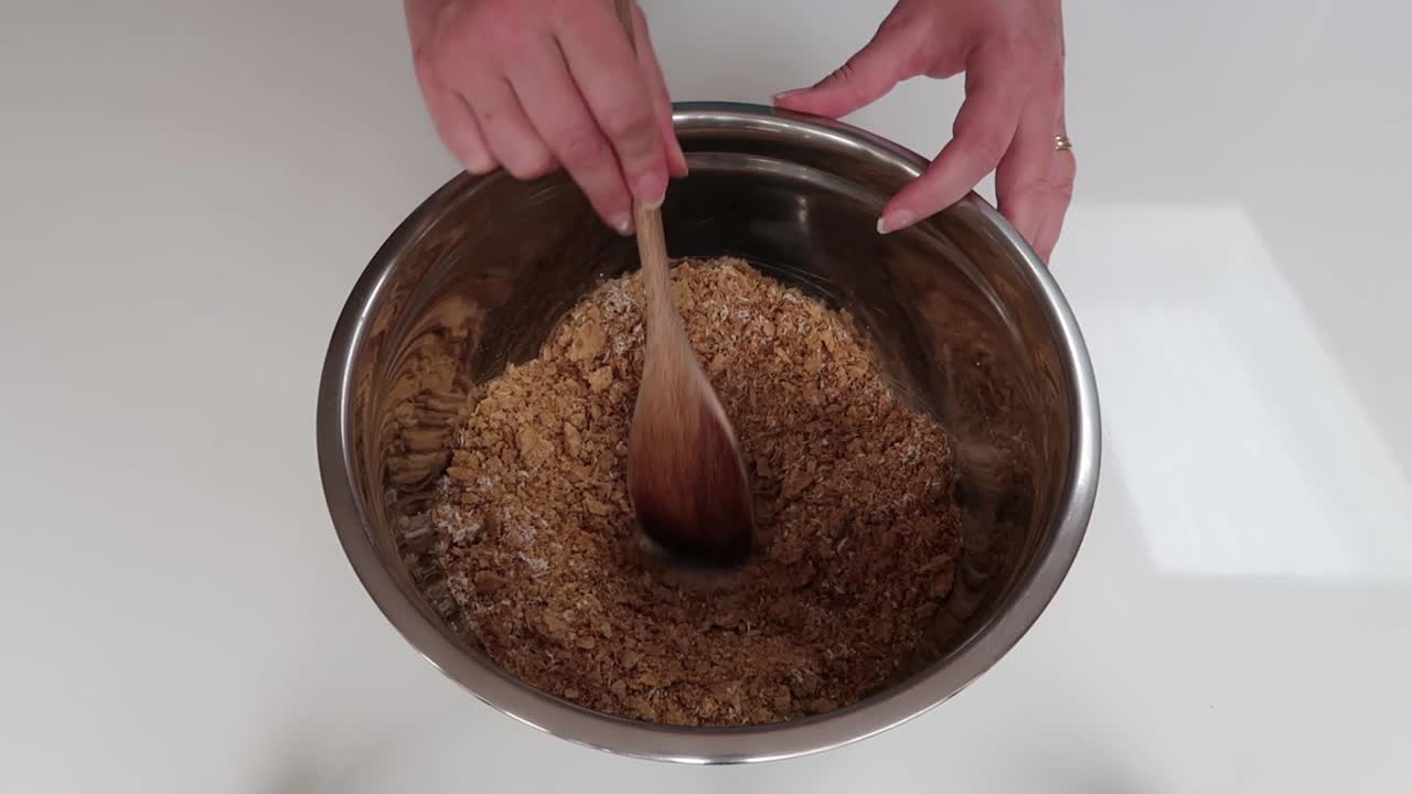 Mixing dry slice ingredients and making a well for the wet ingredients