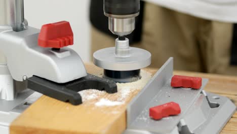 circular hole saw drill bit in action, close-up