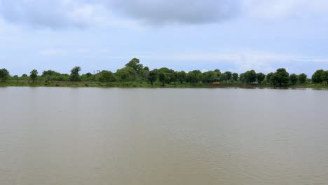 serene lake landscape under cloudy sky