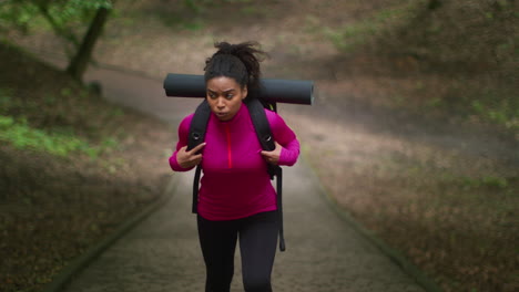 woman hiking in a park