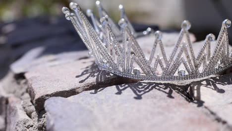 silver bridal crown for the bride's wedding in the garden - close up - fixed camera