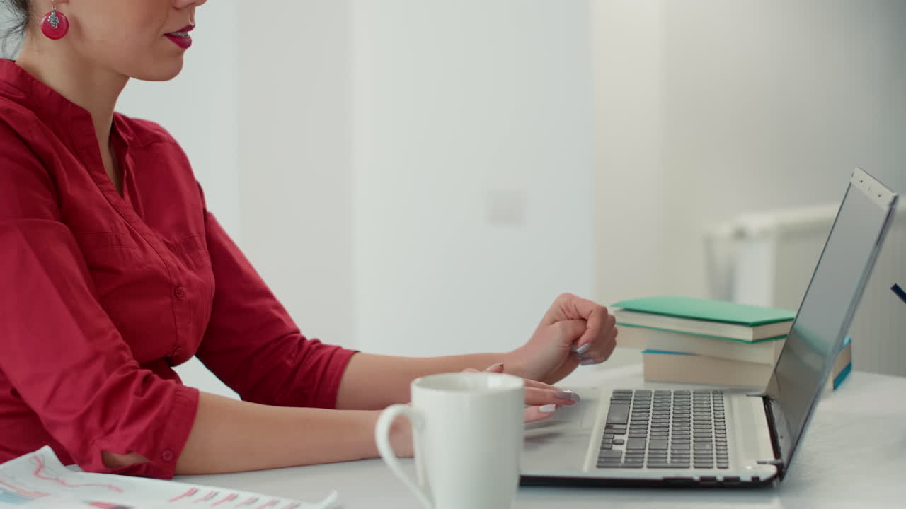 Company employee working on financial strategy with data charts