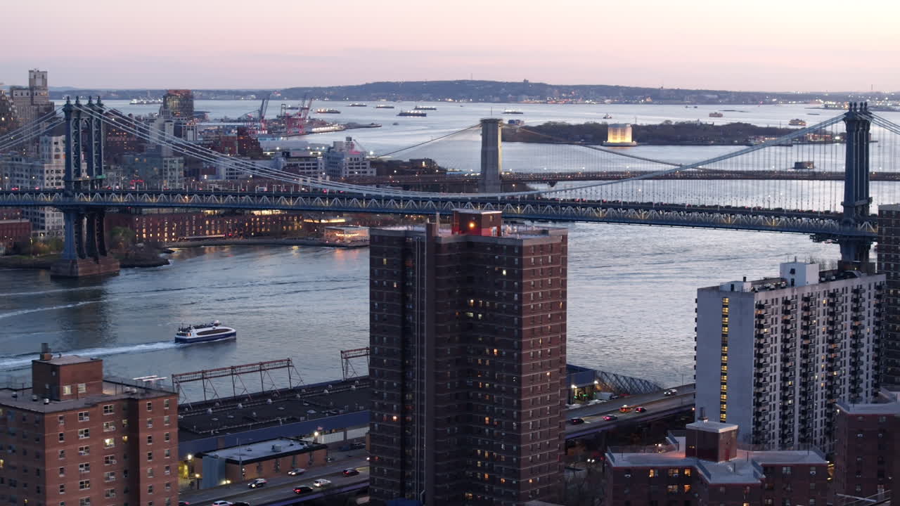 Aerial view of New York City’s East River at night
