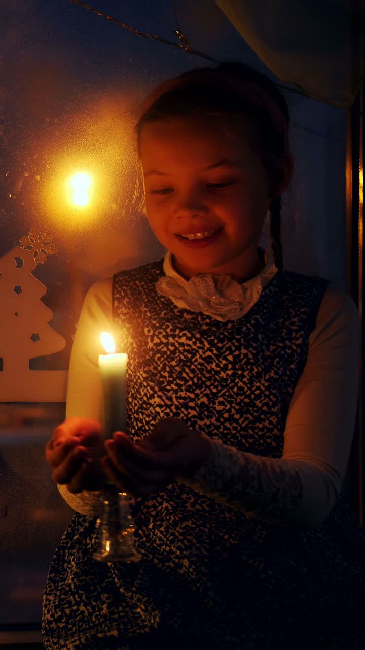 Girl with a Candle on Christmas