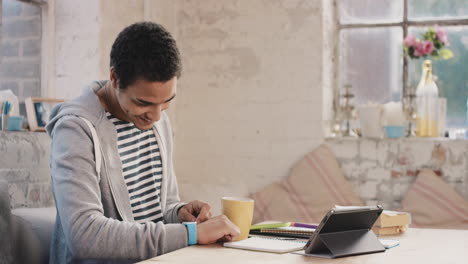 young student using smart watch at home in  morning drinking coffee