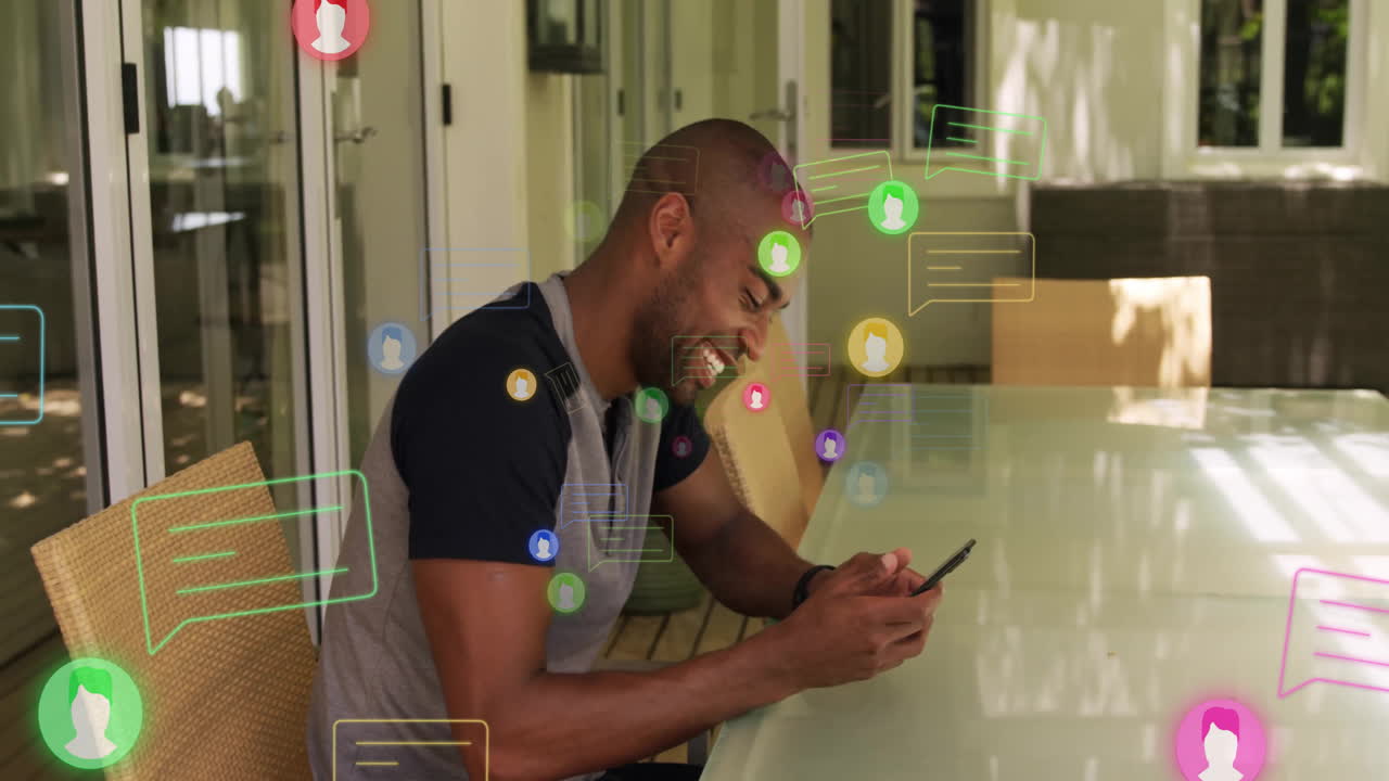 Using smartphone and smiling, man surrounded by social media notifications animation