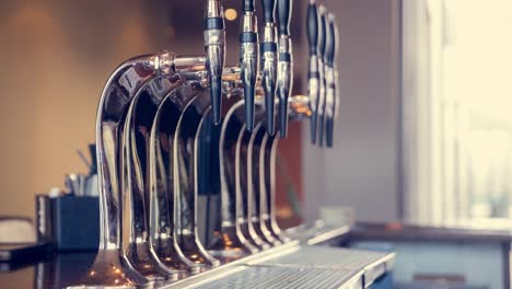 Animation-of-moving-picture-of-beer-taps-on-the-bar