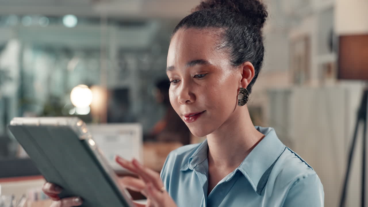 Woman using tablet in office