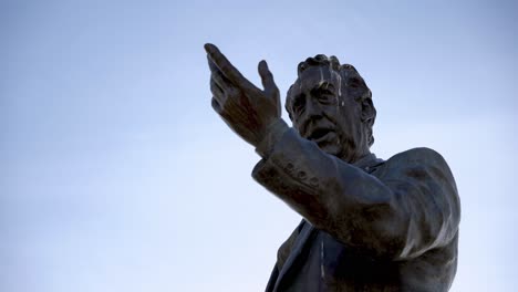 closeup of a statue of a man in the park