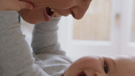 close up mother gently kissing baby enjoying loving mom playfully caring for toddler at home sharing connection with her newborn child healthy childcare