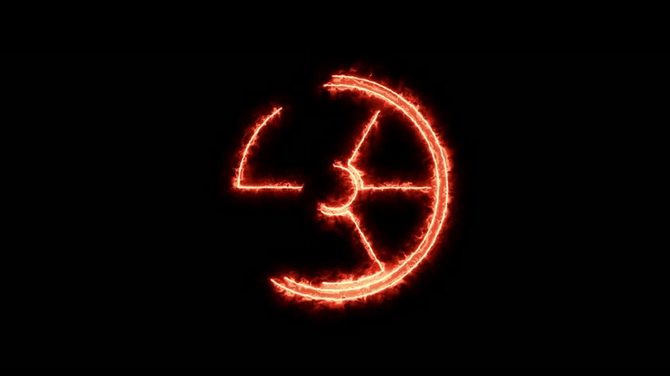 Radiation hazard fire sign slowly appearing in flames on black background