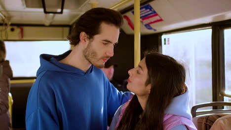 couple talking in the bus