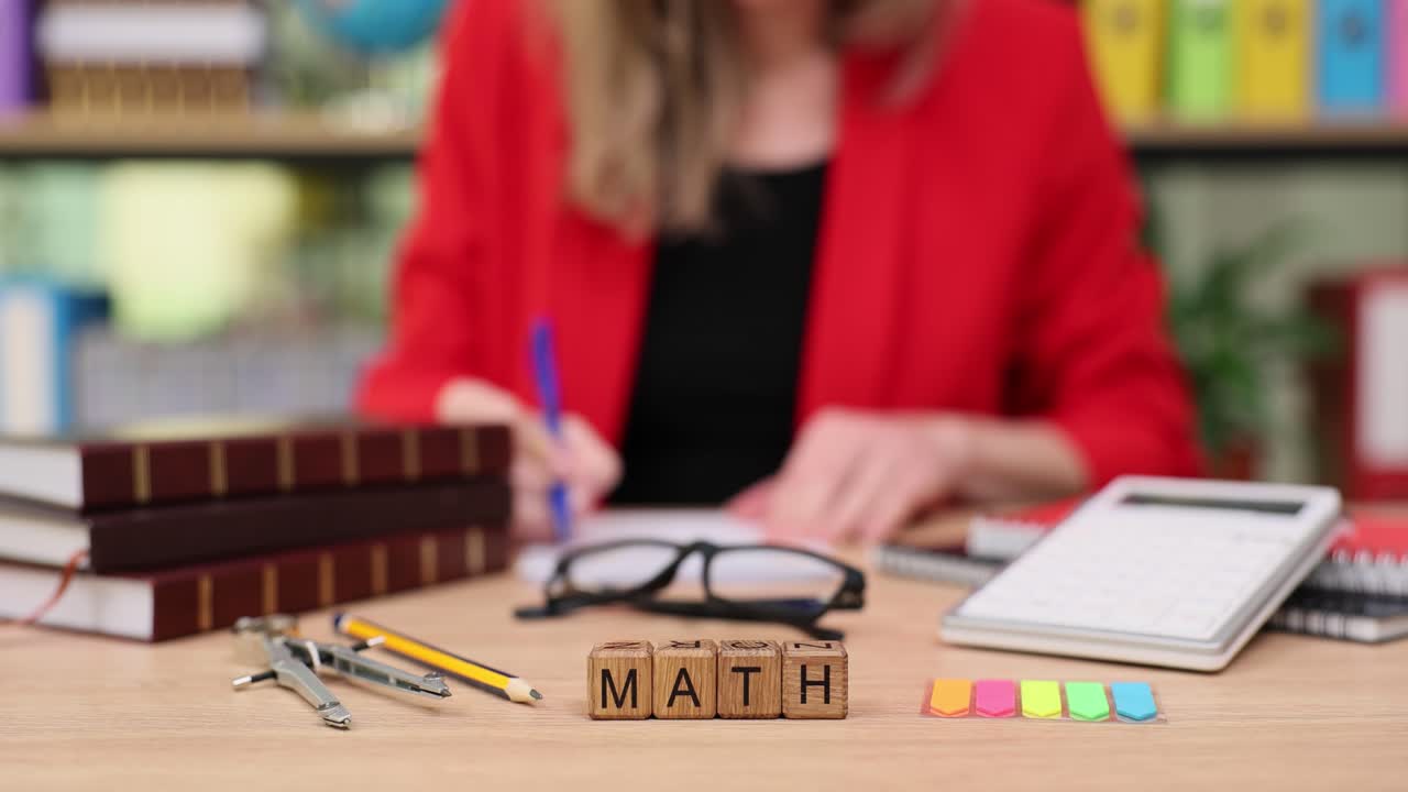 Math Study Desk with Woman Writing