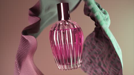 pink perfume bottle with draped fabric