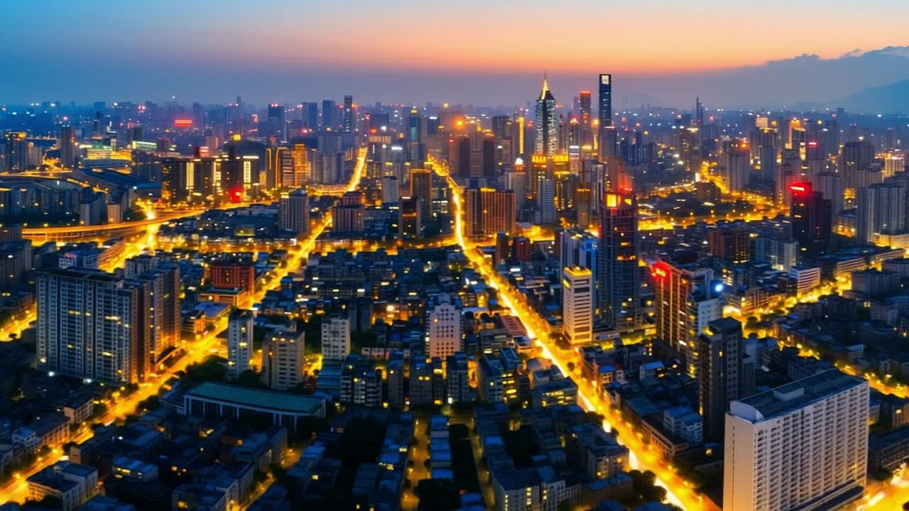 Dusk skyline with twinkling lights. Dusk city skyline with glowing lights and buildings silhouetted against a vibrant sunset.