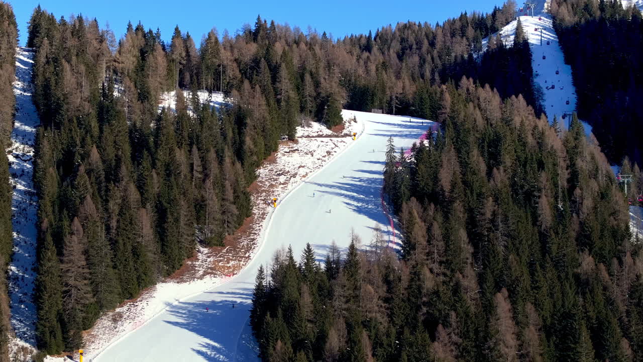 Aerial drone view of a ski resort in Piani di Pezze, Alleghe, Province of Belluno, in the Dolomites, Italy in daylight