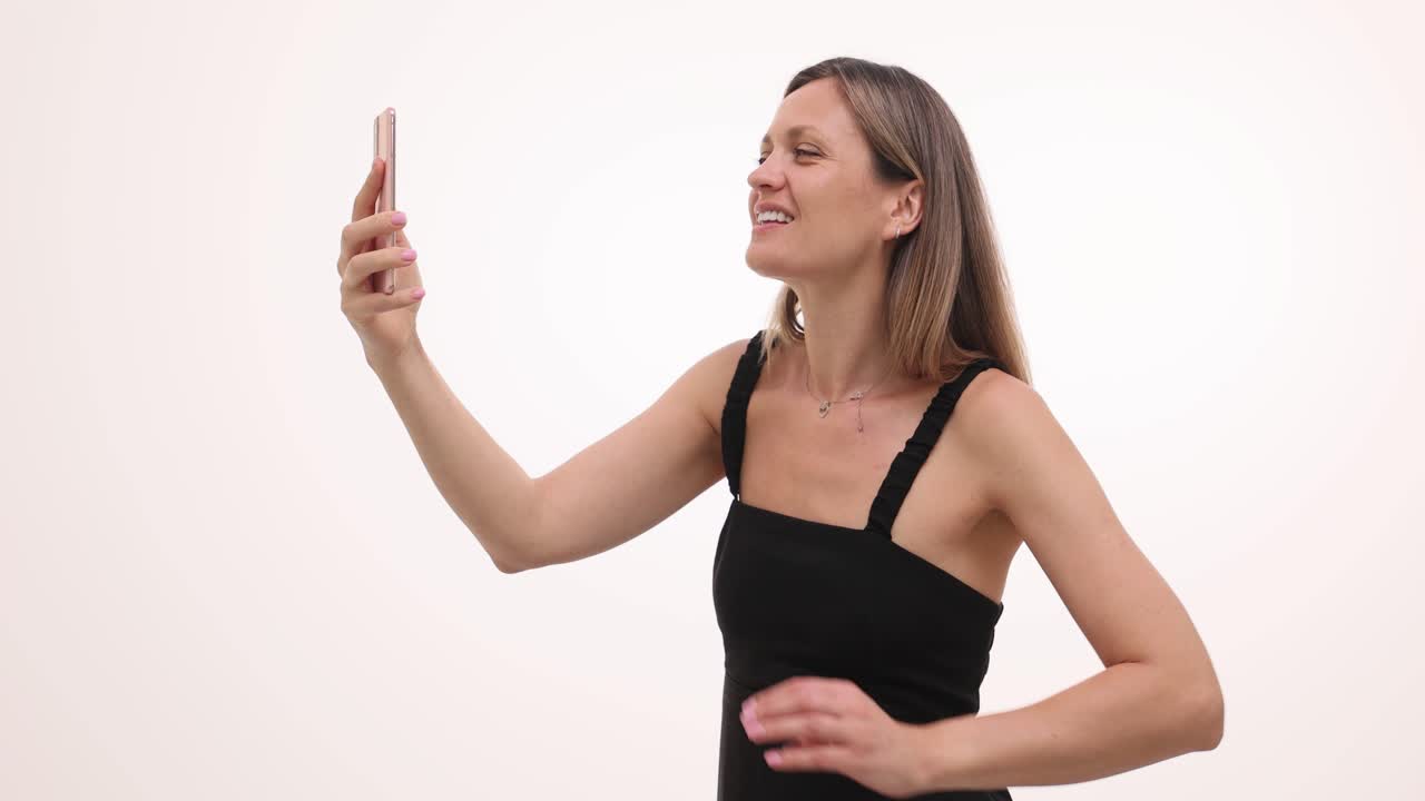 Woman taking selfies