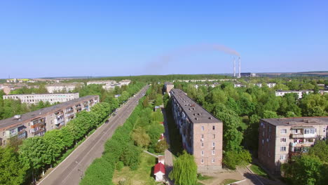 residential area with numerous blocks of flats. drone flying over the green streets of little ukrainian town.