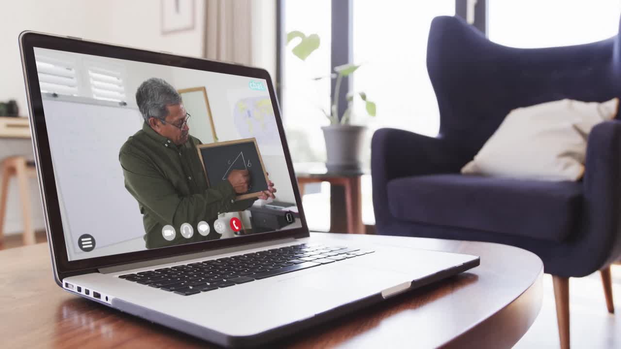 Composition of biracial male teacher on laptop online learning