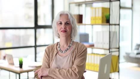 confident senior businesswoman in office