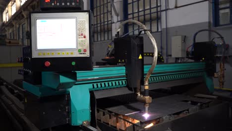 the laser cuts the metal. industrial equipment for metal cutting. machine with a laser