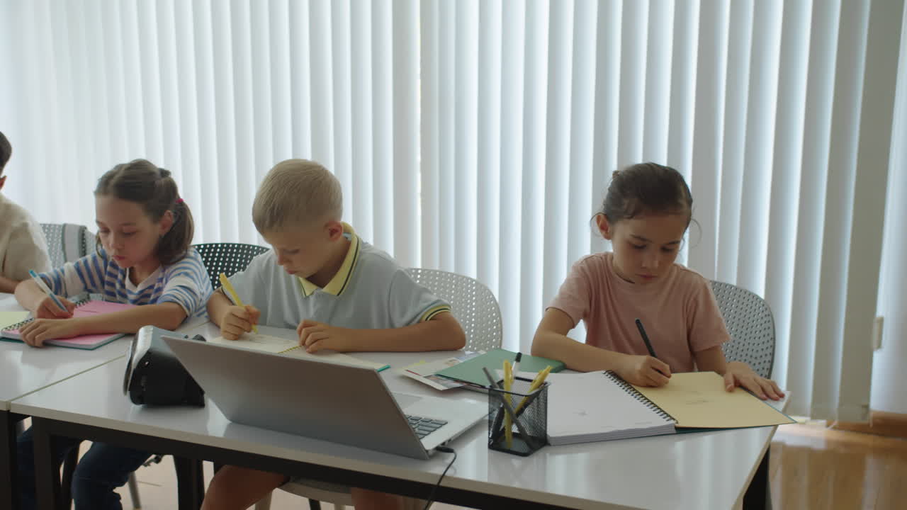 Diverse Kids Performing Test Tasks at School