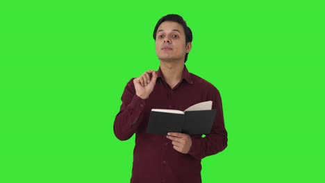 indian teacher solving student problems green screen