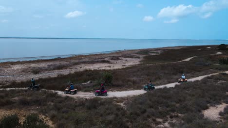 atv quad biking adventure on a coastal dirt track