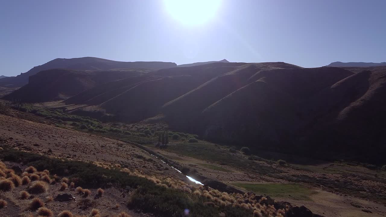 Aerial view in mountain valley next to river in Patagonia, Argentina