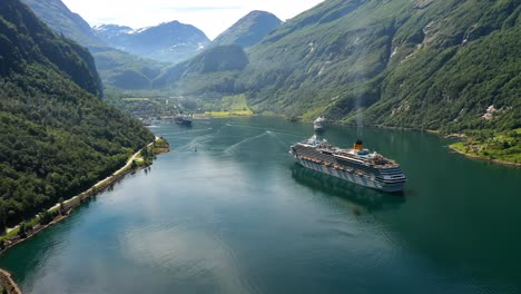 cruise liners on geiranger fjord, norway
