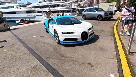 supercar driving near yachts in monte carlo