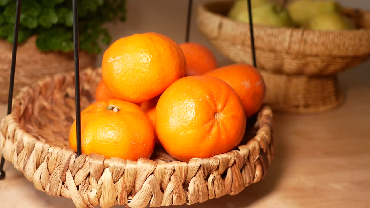 Oranges in a Straw Basket