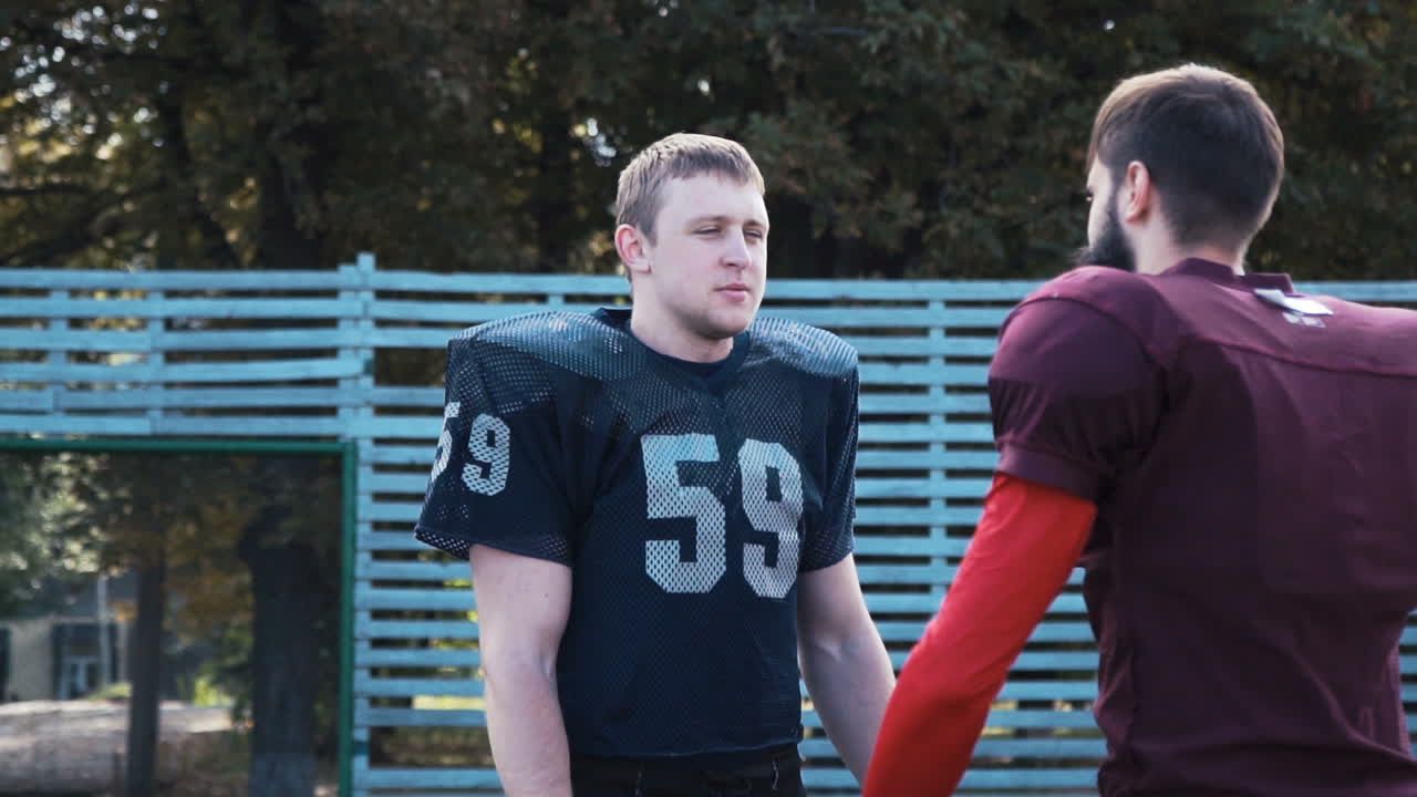 American football players in uniform on a field