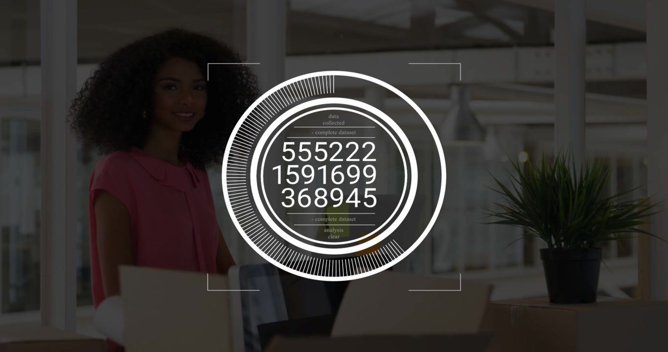 Woman standing at desk in business office, focusing on laptop and monitoring HUD filling and fading