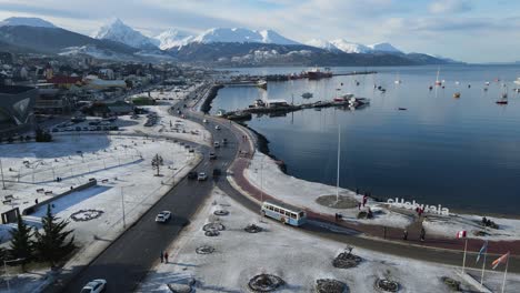 mountain village by the sea with boats in the harbor in patagonia