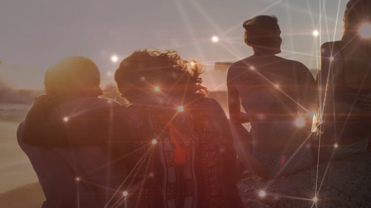 해변에서 즐겁게 지내는 행복한 친구 그룹에 대한 연결 네트워크의 애니메이션