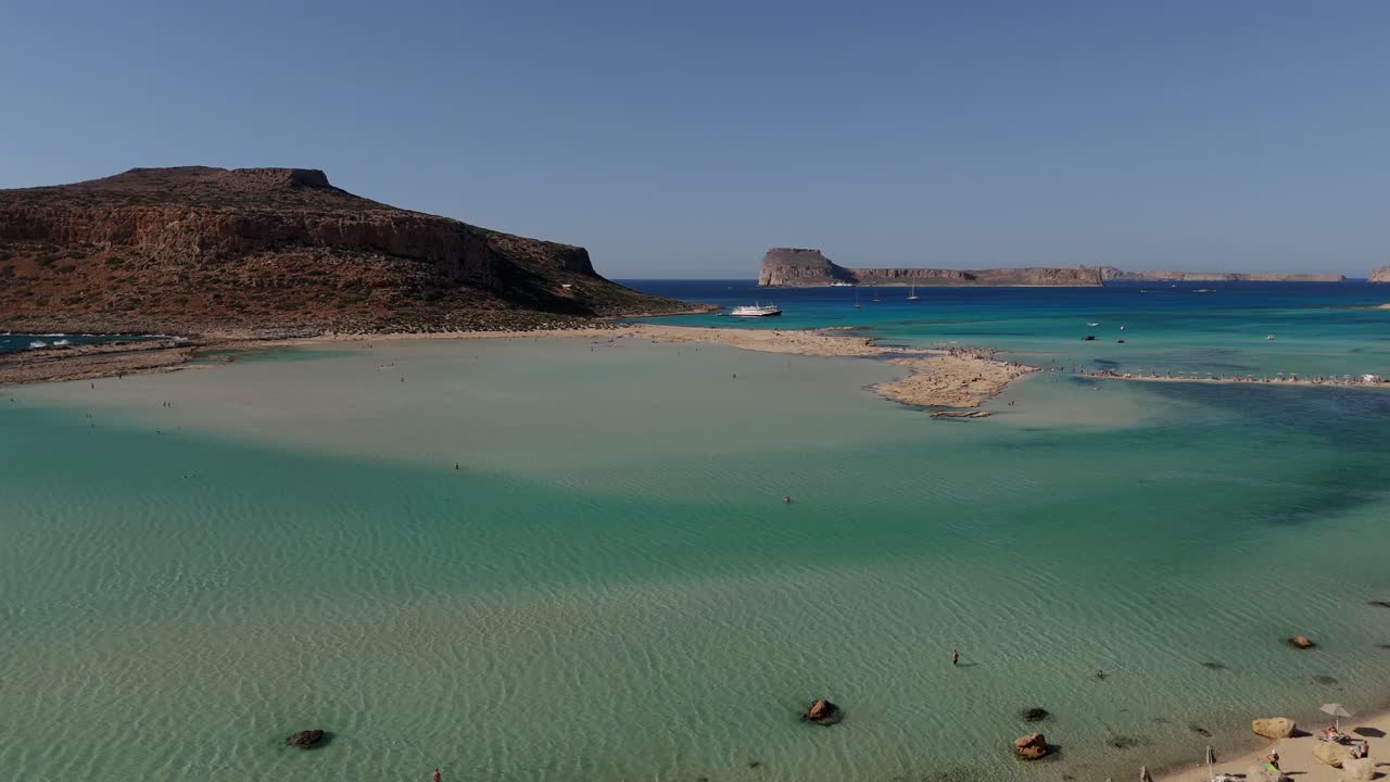 Aerial - Balos Lagoon with turquoise waters and rocky islands, Crete, Greece