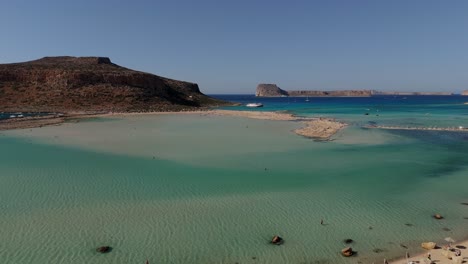 aerial - balos lagoon with turquoise waters and rocky islands, crete, greece