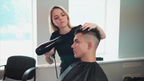 hair styling session at a salon