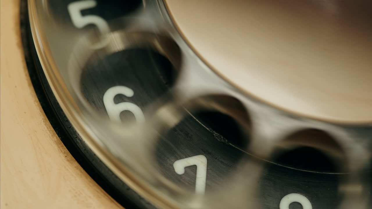 Retro vintage phone, A yellow rotary telephone is displayed on a wooden desk, adding a nostalgic touch