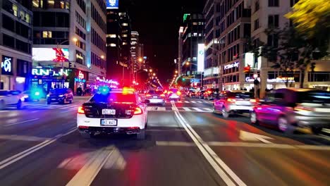 police car on a night city street