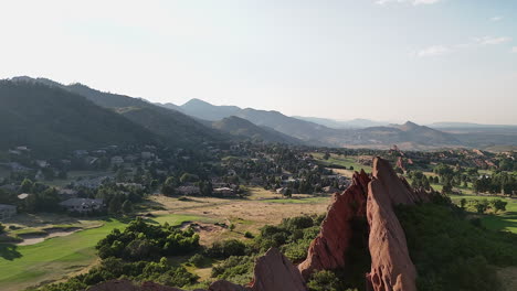 flyover golden sandstone rock fins revealing littleton, colorado, usa