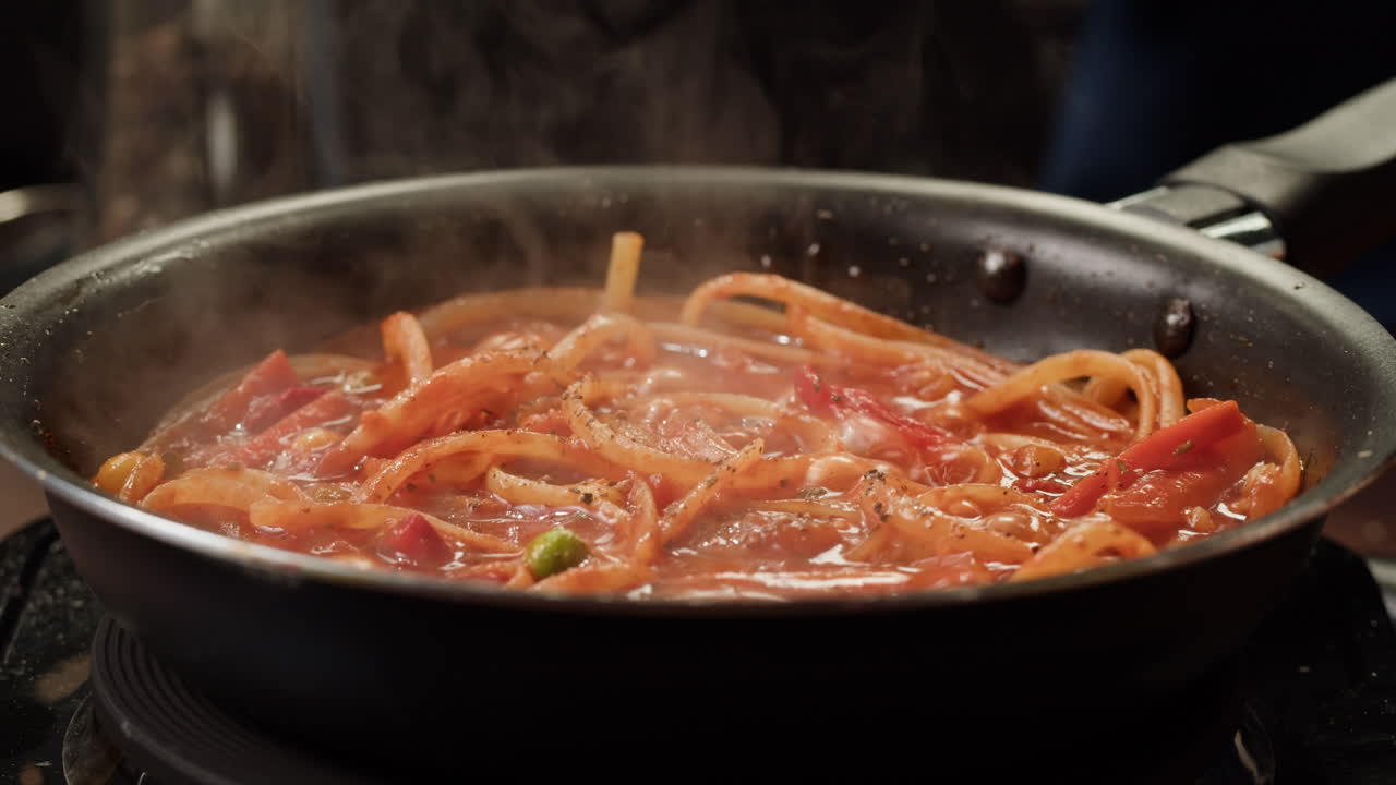 Cooking Pasta with Tomato Sauce
