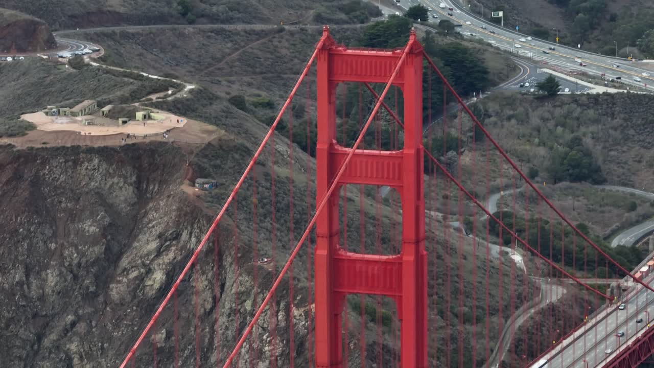 Golden Gate Bridge tower with view of Battery Spencer and highway 101