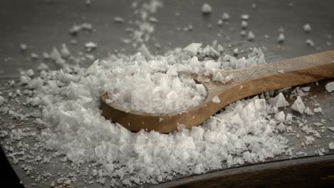 White-salt-crystals-fall-out-in-slow-motion.