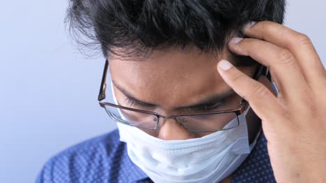 stressed man wearing a mask